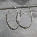 Open Spiral Drop Hoop Earrings with Curved Wire Detail
