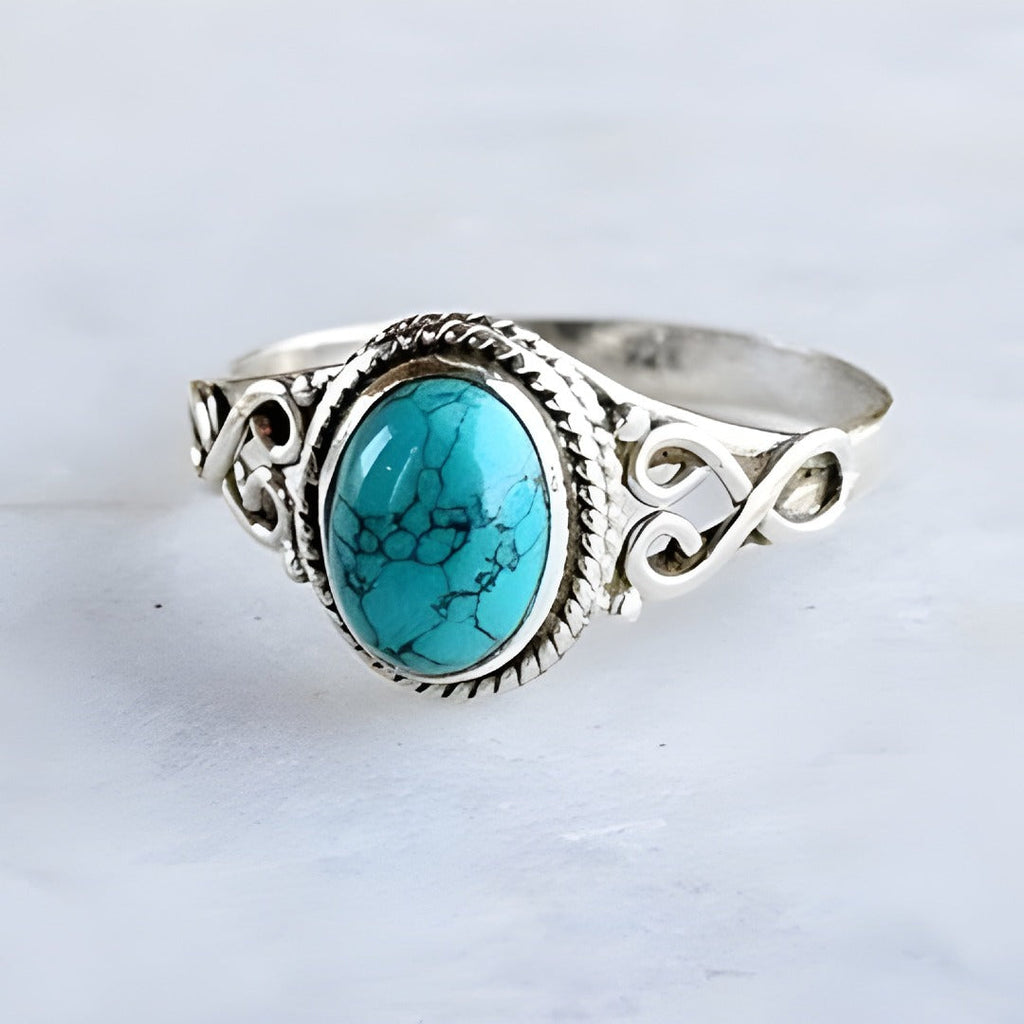 Sterling Silver Oval Turquoise Ring with Rope-Twist Bezel and Filigree Band
