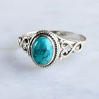 Sterling Silver Oval Turquoise Ring with Rope-Twist Bezel and Filigree Band